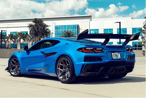 Blue C8 E-Ray Corvette with E5 Talladega forged wheels — rear view